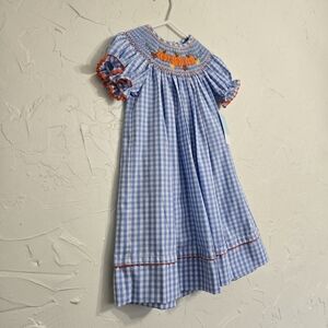 Anavini Girls Blue Gingham Smocked Peter Rabbit Dress - White Collar main image 0